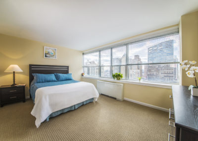 Rittenhouse Claridge furnished master bedroom in Philadelphia, PA with city views
