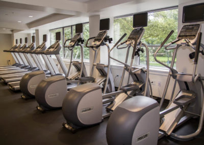 Ellipticals and treadmills in fitness center at Rittenhouse Claridge apartments 