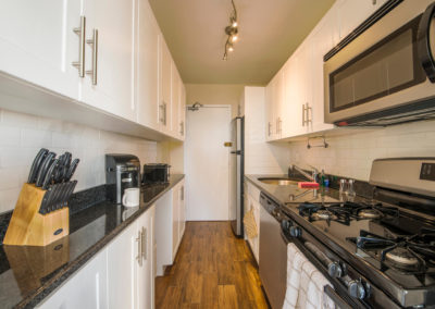Kitchen with stainless steel appliances and granite countertops in Philadelphia apartment